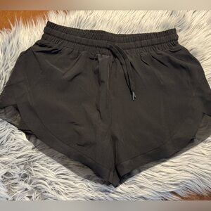 HALARA Women’s mid rise flowy running shorts (3”)